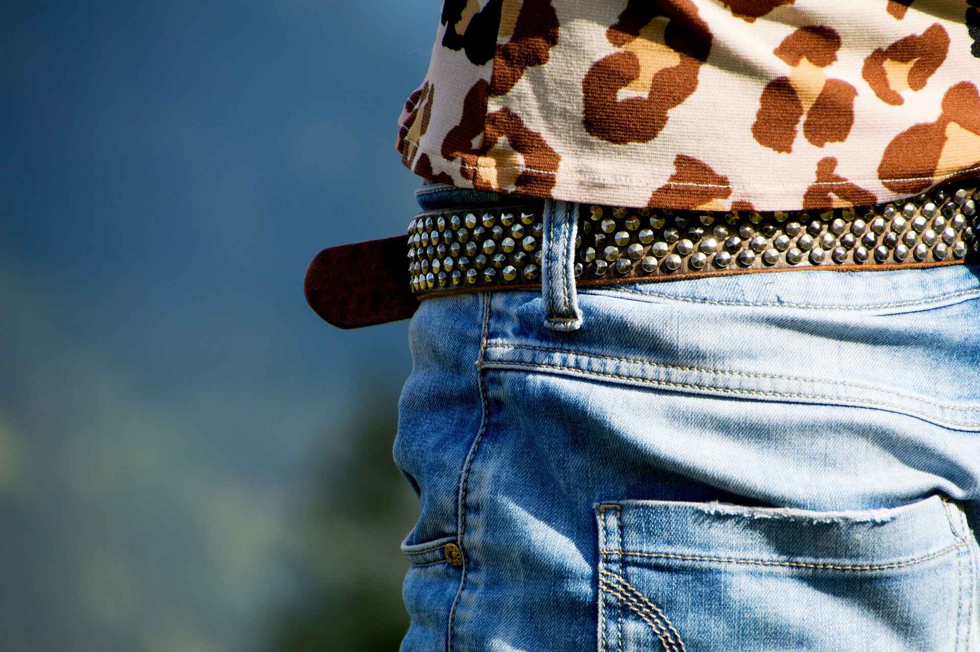 man wearing a tooled leather belt
